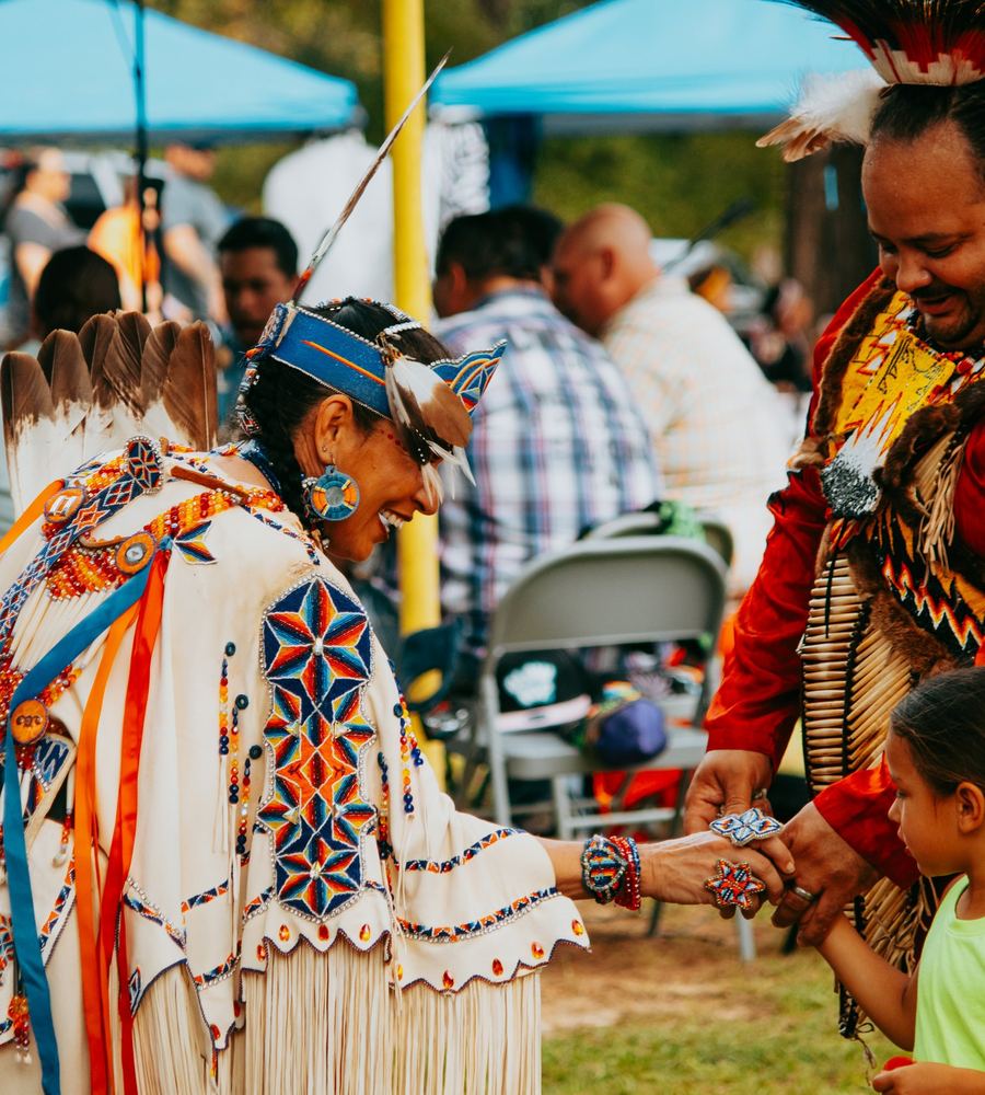 Tribal members greeting each other at the MOWA Choctaw pow wow